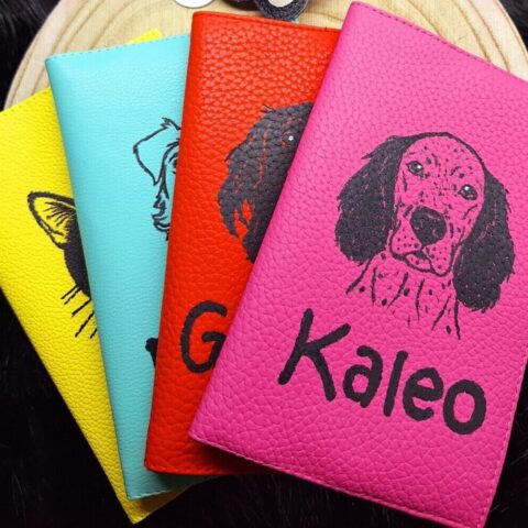 Pet passport cover with pet's picture and name